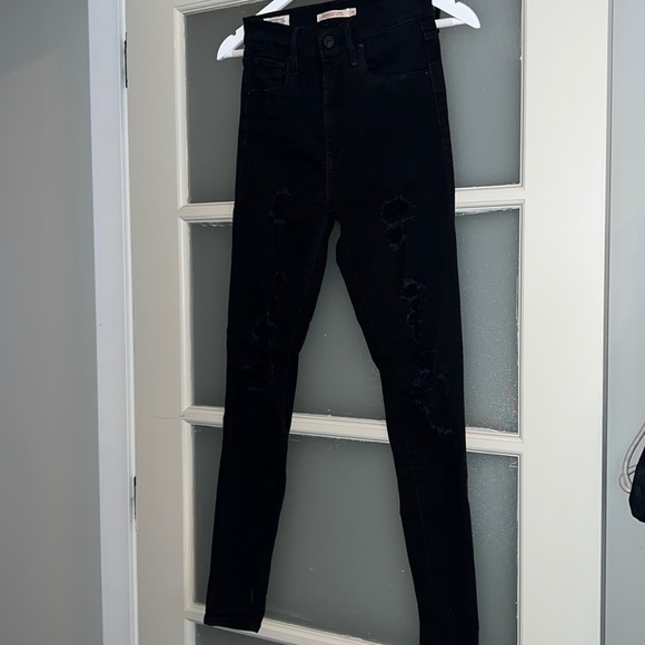 Black super high rise ripped skinny jeans from Levi’s - Picture 1 of 6